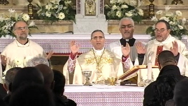 Priests holding Mass for victims of the Costa Concordia disaster