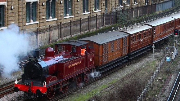 A restored steam train beginning its journey from to Moorgate, as part of the London Underground's 150th anniversary celebrations.