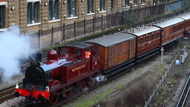 A restored steam train beginning its journey from to Moorgate, as part of the London Underground's 150th anniversary celebrations.