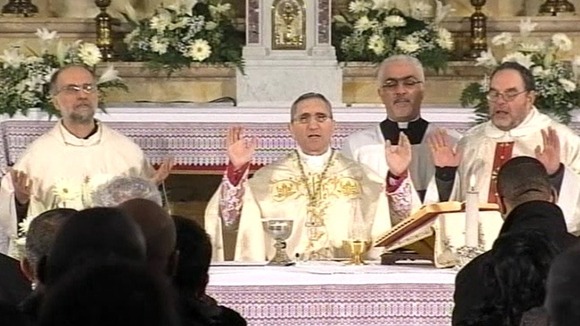 Priests holding Mass for victims of the Costa Concordia disaster