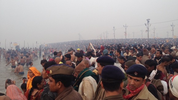 Crowds cover the banks of the Ganges as the Kumbh Mela begins