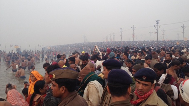 Crowds cover the banks of the Ganges as the Kumbh Mela begins