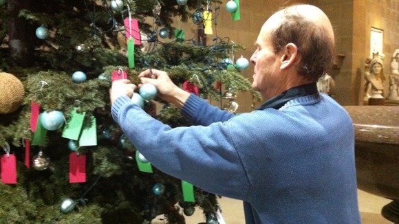 Philip Bowmer, helping take down the last of the festive decorations.