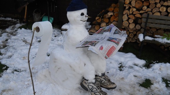 Some interesting poses for snowmen in Snettisham, Norfolk
