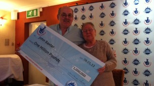 John and Carol Baxter from Baldock with their cheque