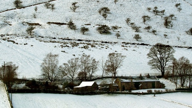A farm house surrounded by snow in Derbyshire