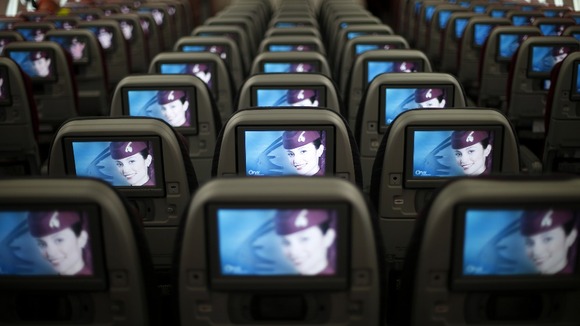 Seats and screens in the economy class cabin of the Qatar Airways Boeing 787 Dreamliner