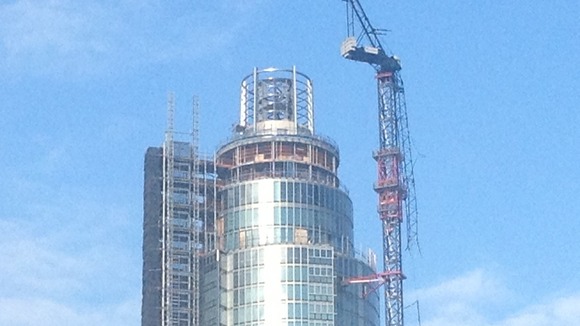 Broken jib of crane still hanging