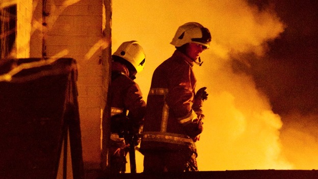 Firemen on roof