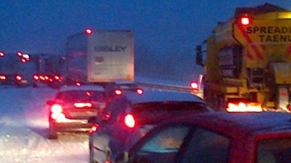 A tailback on the M4 in south Wales has prompted a section of the motorway to be closed because of the snow