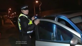 Police patrol at night to curb car crime.