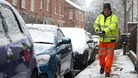 A council workers grit the pavements around Bingham, Nottinghamshire