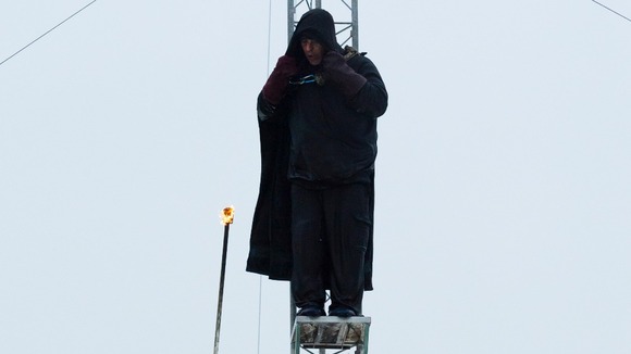 The act's diving sequence culminated in the dramatic fire stunt.