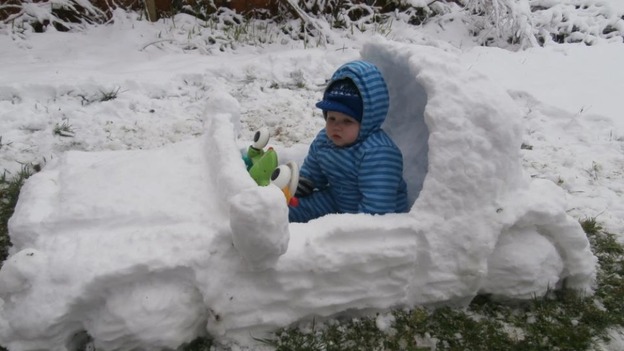 Mike Nash's grandson Vinni in his snow mobile