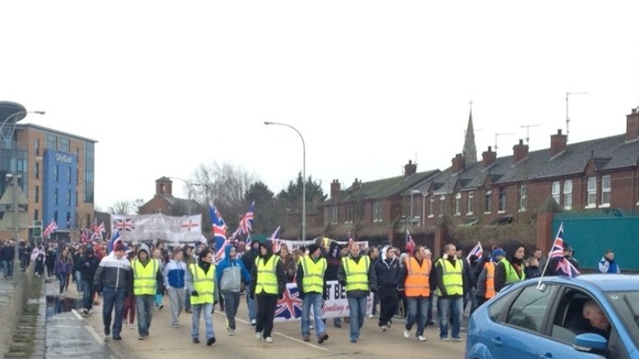 The crowd walking into Belfast City centre