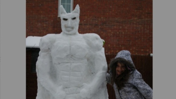 In his trademark suit, the snow-drenched Batman figure pictured in Berkshire's icy conditions.