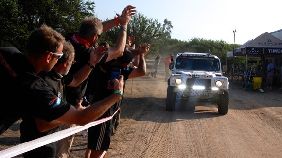 Race2Recovery celebrate as their car approaches the Dakar Rally finishing line.