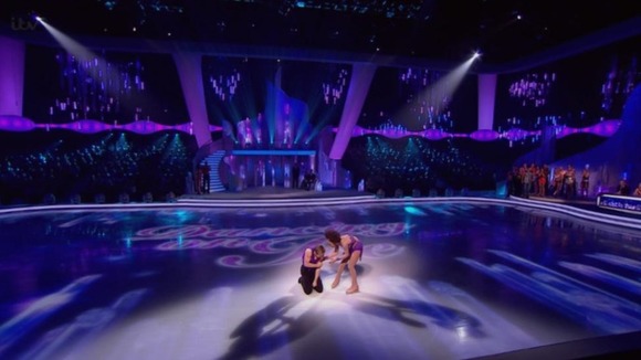 Baroness Oona King checks to see if her partner Mark Hanretty is ok after his tumble