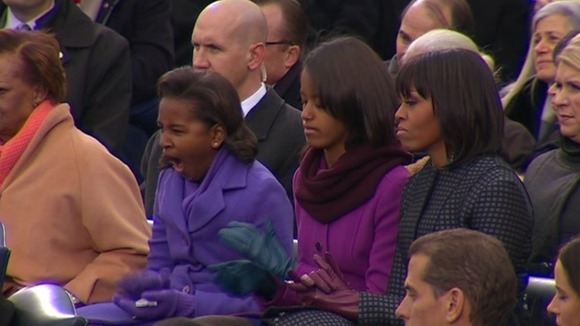Sasha Obama seated next to her sister Malia and mother Michelle at the Inauguration