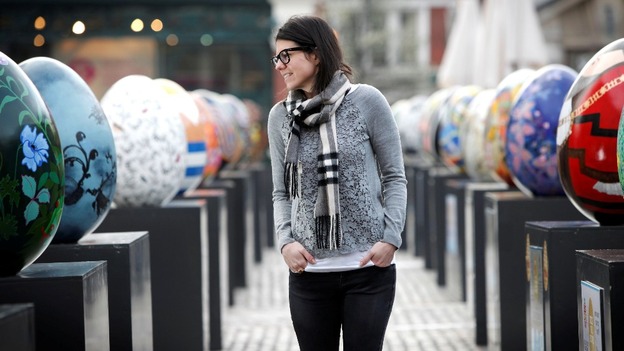 A woman looks at eggs on display in Covent Garden