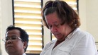 Sandiford, with her translator, listens to the judge during a trial in Denpasar in Bali 