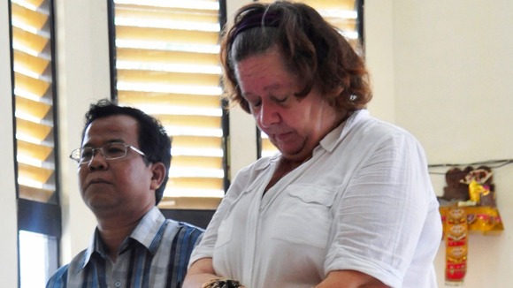 Sandiford, with her translator, listens to the judge during a trial in Denpasar in Bali