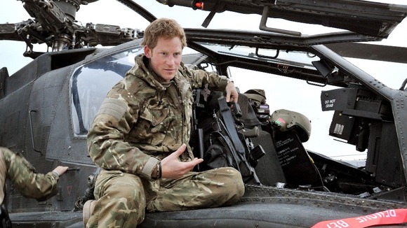 Prince Harry outside his Apache helicopter.