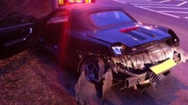 A badly damaged car on the A40.