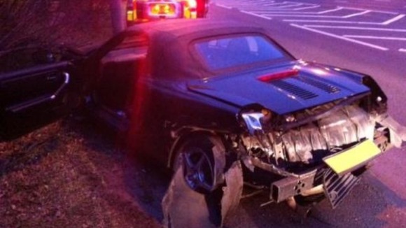 A badly damaged car on the A40.