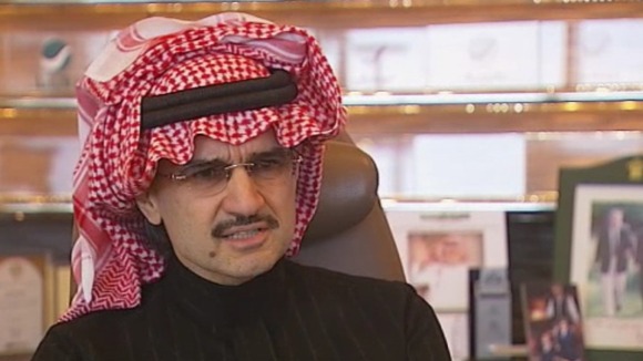 Saudi Prince Al-Waleed bin Talal speaking to John Irvine