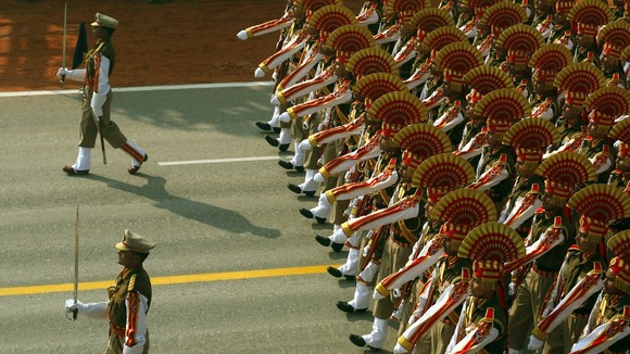 Indian soldiers march during the full dress rehearsal for the Republic Day parade in New Delhi