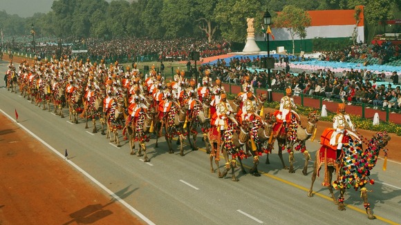 Indian Border Security Force soldiers ride their camels