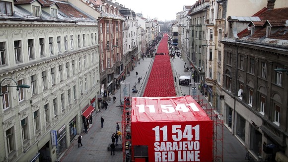11,541 red chairs are pictured along Titova street in Sarajevo