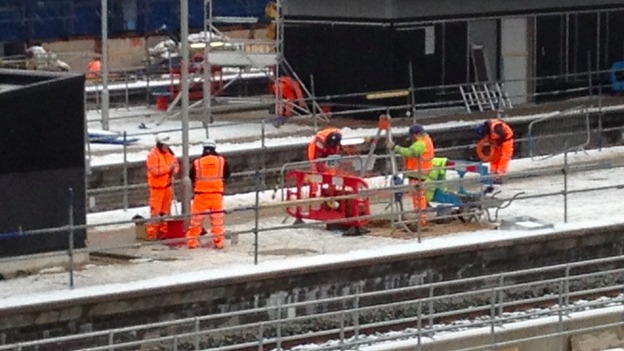 Workers on snow