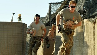 Prince Harry seen in November 2012 racing off on another mission in Afghanistan