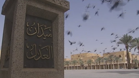 Birds fly over Justice Square, Saudi Arabia