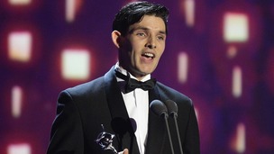Coin Morgan accepts the award for Best Male Drama Performance for Merlin during the 2013 National Television Awards at the O2 Arena