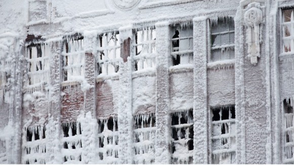 Firefighters battled with ice covered ladders and freezing hoses