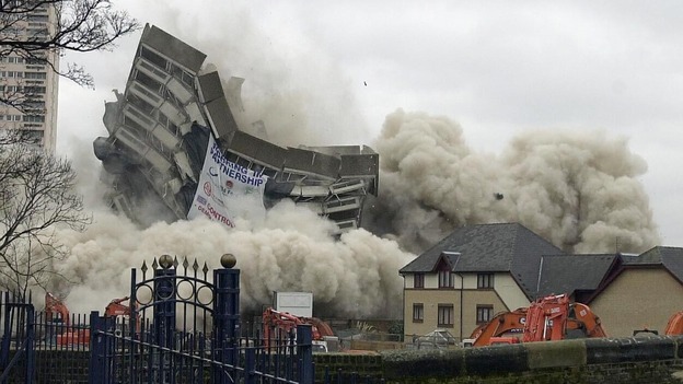 The 60's built Cavan House and Antrim House, in Old Ford, Hackney in East London, during their demolition by explosives