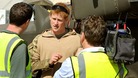 Prince Harry in November 2012 giving a TV interview by his helicopter in Camp Bastion