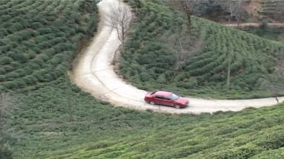 Going nowhere fast Mustafa Mert drives backwards up a hill