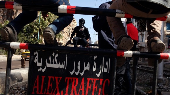 Protesters block roads around a main square in Alexandria, Egypt.