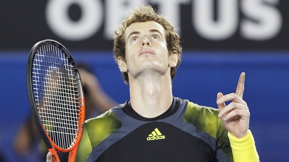 Andy Murray celebrates defeating Roger Federer in the Australian Open