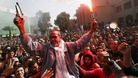 The father of an Al-Ahly fan who was killed in Port Said celebrates with fans in Cairo