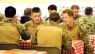 Prince Harry with fellow air crew in the DFAC (Dining Facility)