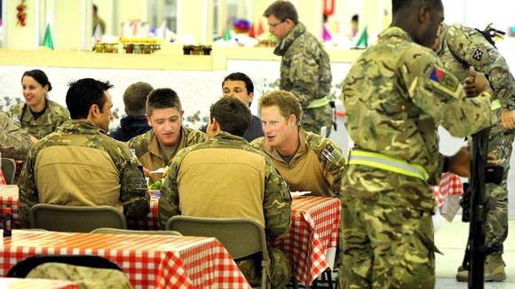 Prince Harry with fellow air crew in the DFAC (Dining Facility)