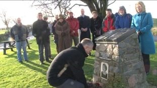 Russell Brown MP lays a wreath