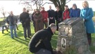 Russell Brown MP lays a wreath