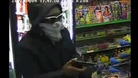 Robber holds gun up at Leicester shopkeeper