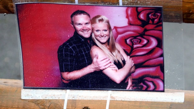 One of the pictures left at the scene in Hanham, near Bristol, in tribute to Ross and Clare Simons, who were killed yesterday